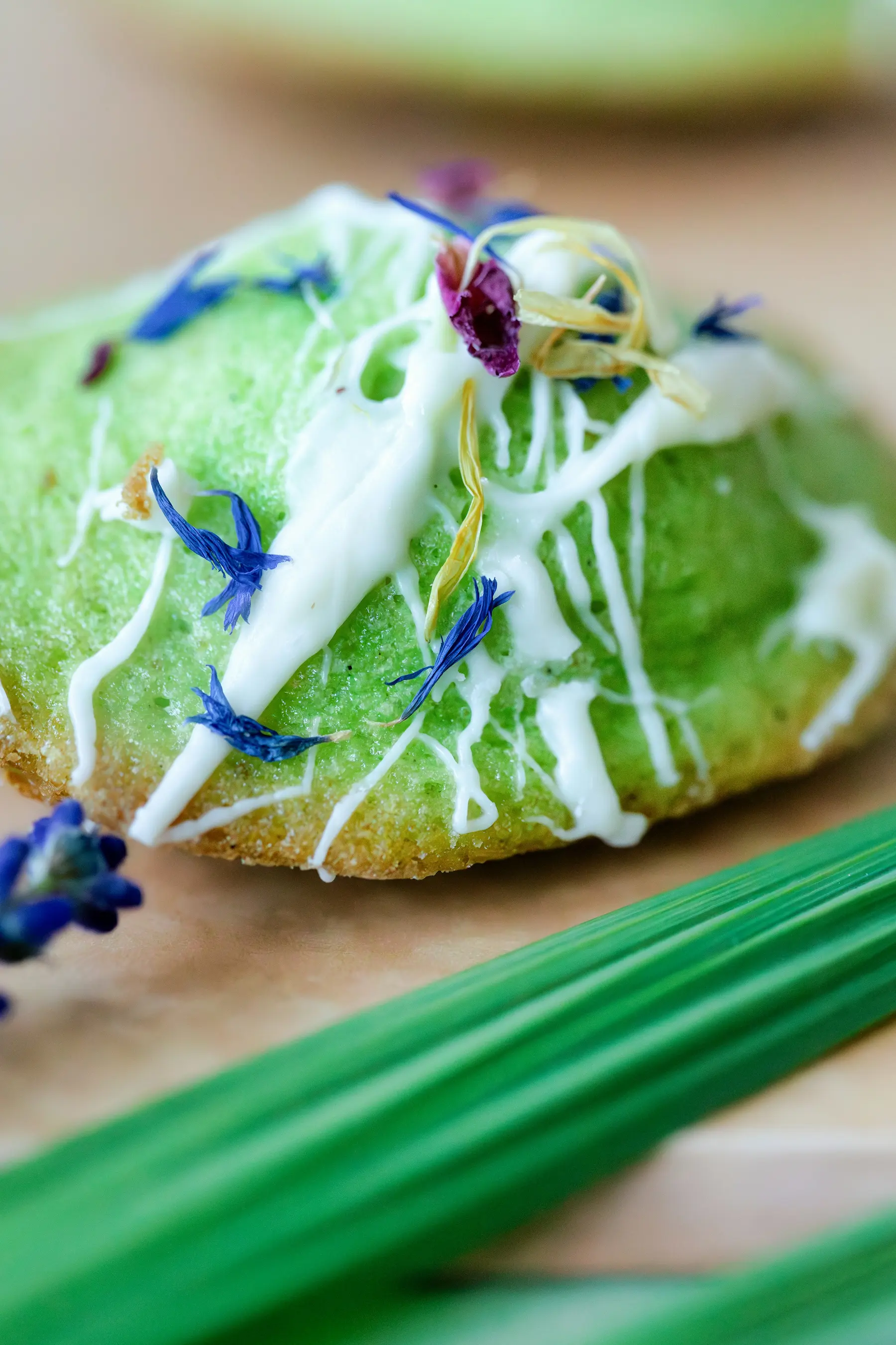 Artisan pandan pastry with white chocolate drizzle